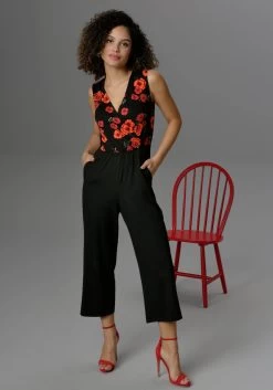 Beachtime Strandjurk Met Bloemenprint 25 Beachtime Strandjurk Met Bloemenprint -Dames Winkel aniston casual jumpsuit met gebloemde top in wikkel look en unikleurige broek in culotte model zwart 3